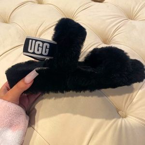 Authentic black UGG slippers